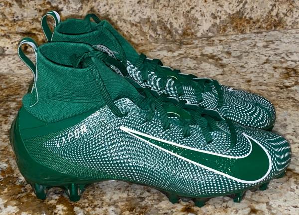 green and white nike football cleats