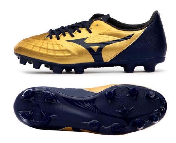 soccer cleats with gold bottoms
